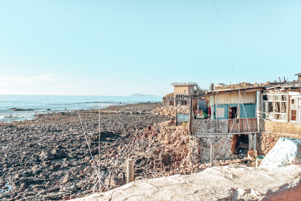  Puerto Nuevo  rocky beach near a fish market. 