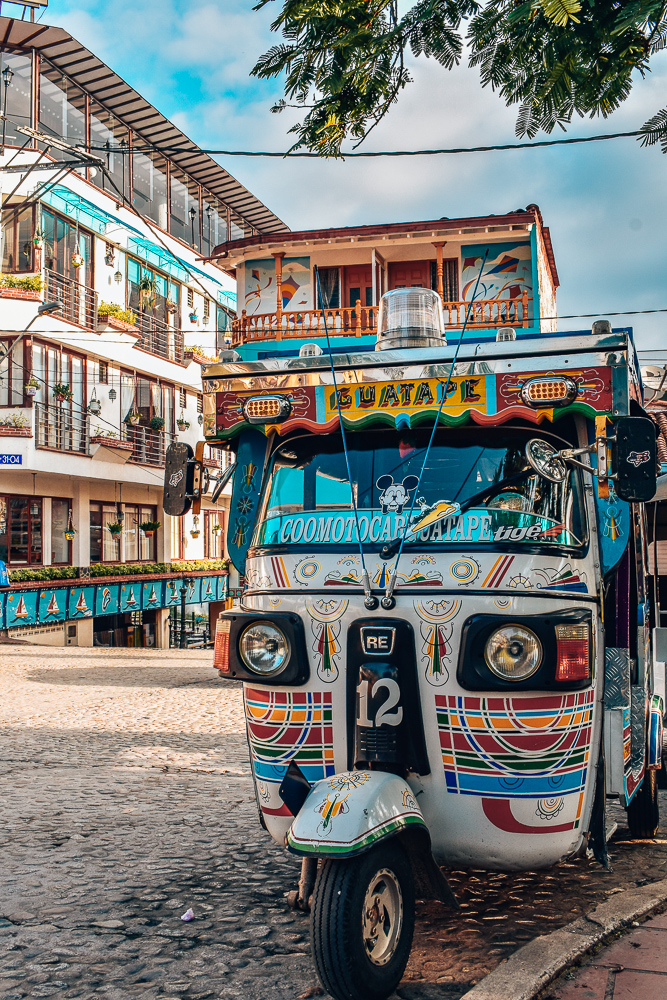 Guatape colombia colorful tuktuk 