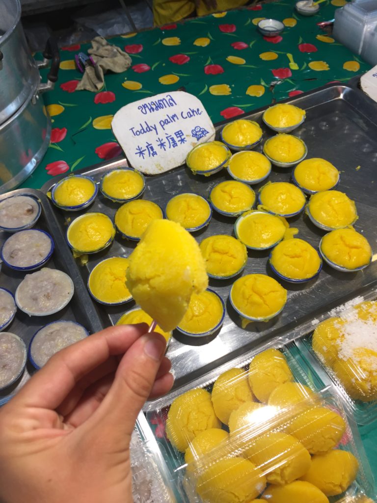 Tasty yellow cakes at street market in Thailand. 