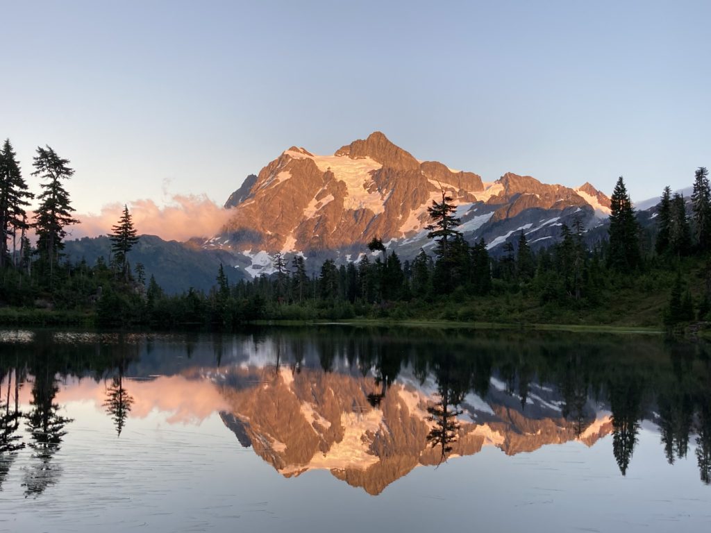 reflection of the mountain in the lake water. 