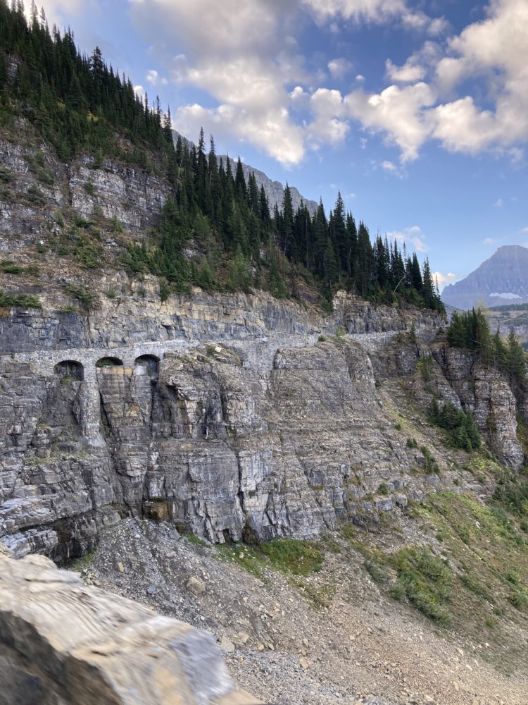 viewpoint of a highway winding through the mountains. 