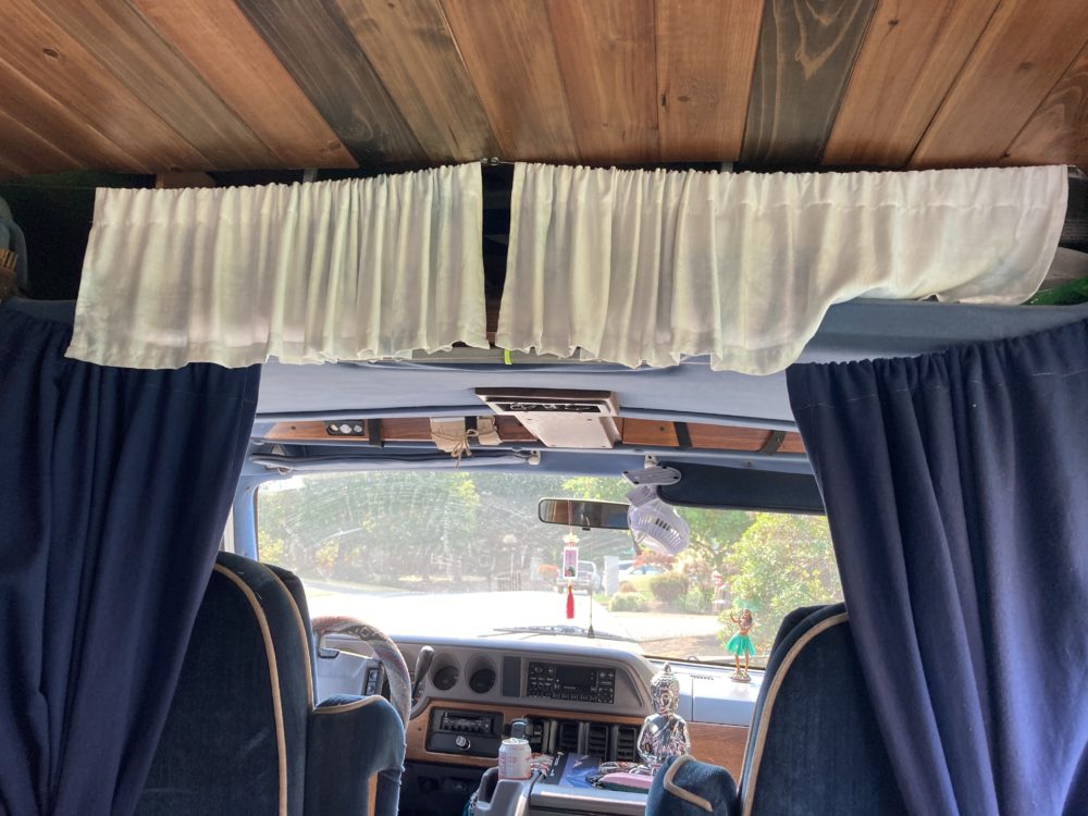 Curtains covering my overhead storage area in the van. 