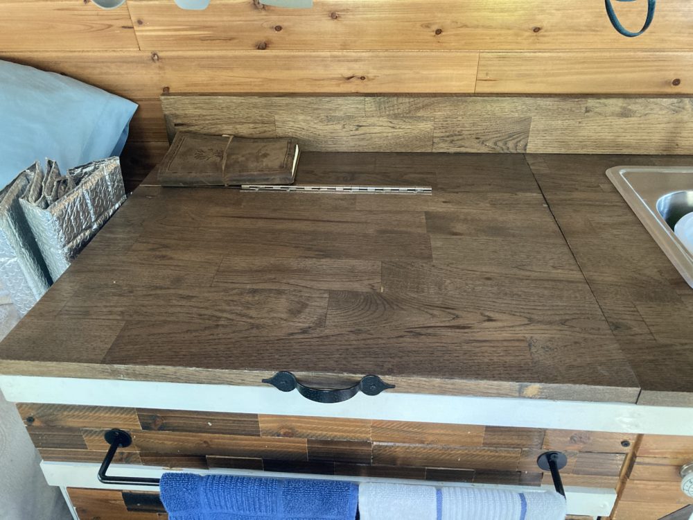 thick wooden countertop from the inside of my campervan 