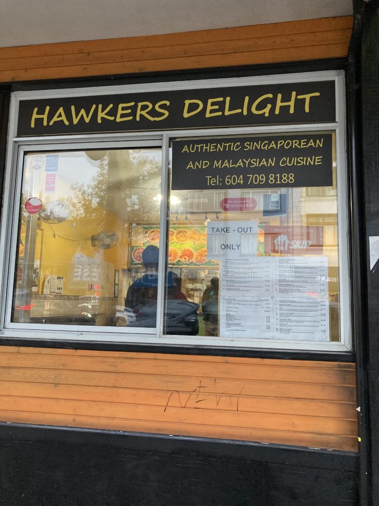 window of Hawkers delight. Must eat meals in Vancouver. 