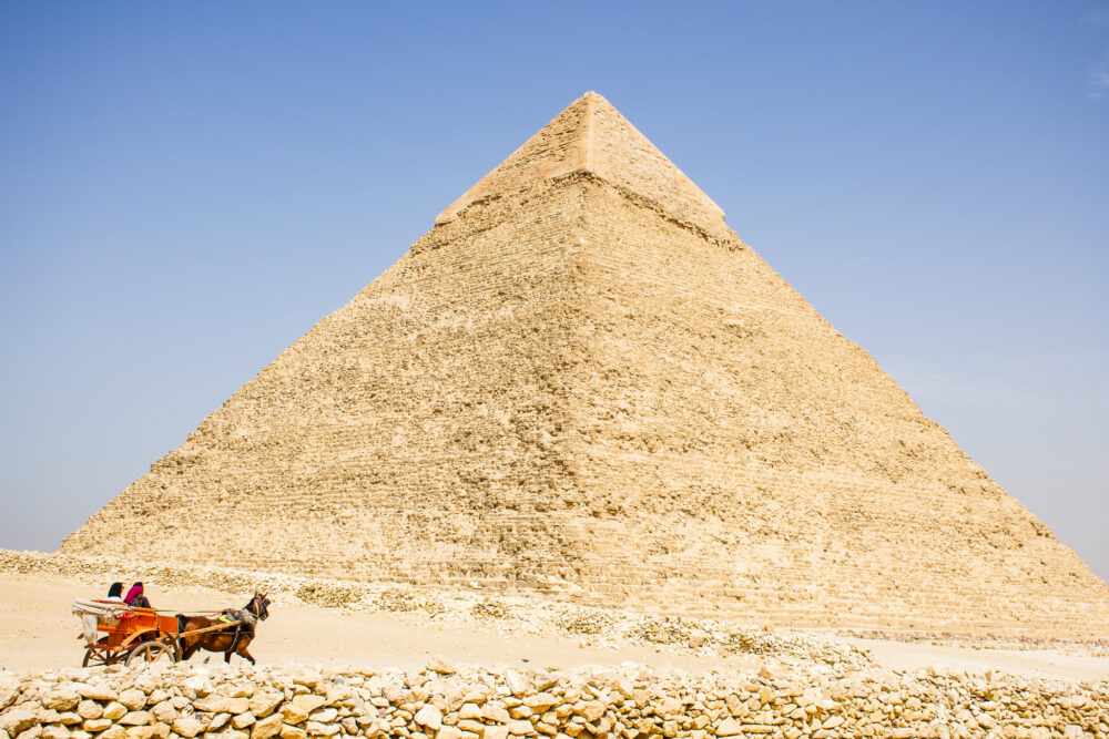 Tourists at the pyramids. travel Egypt & Jordan independently