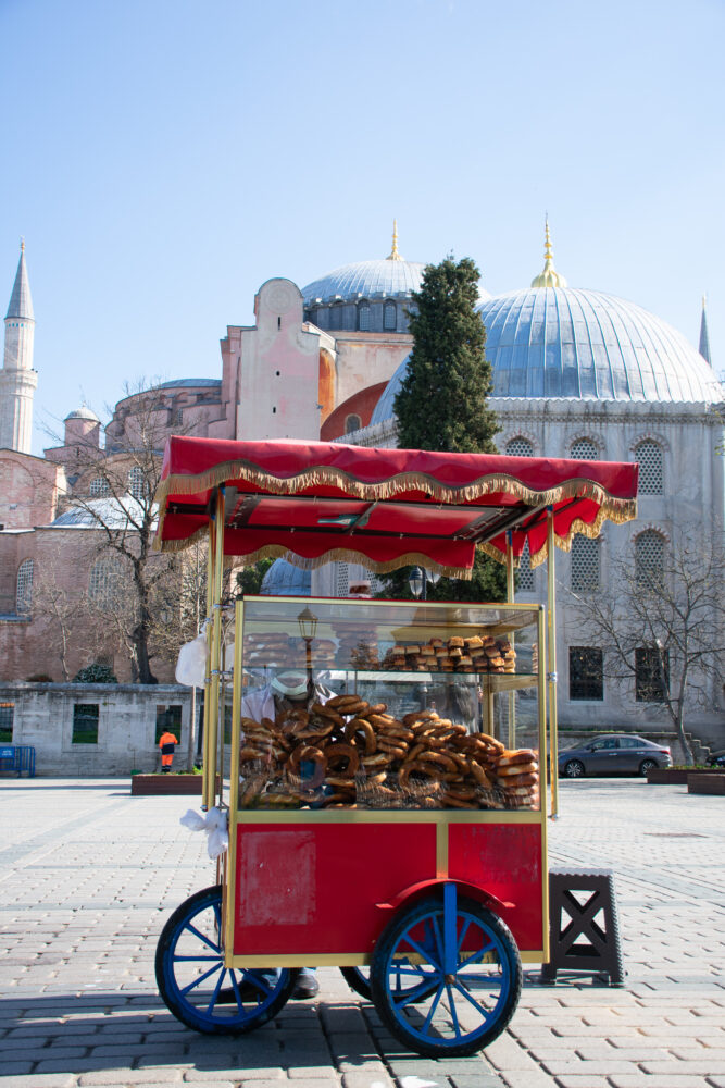 Simit cart in front of a mosque 