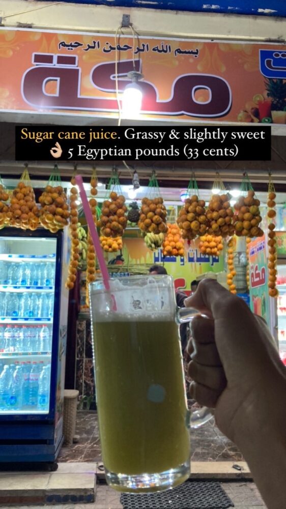 sugar cane juice in front of juice shop