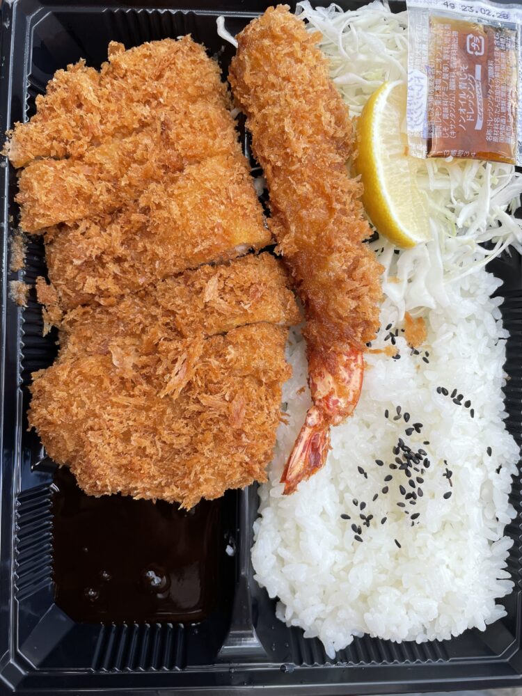 A bento box from japan 7/11 with fried food and rice. 