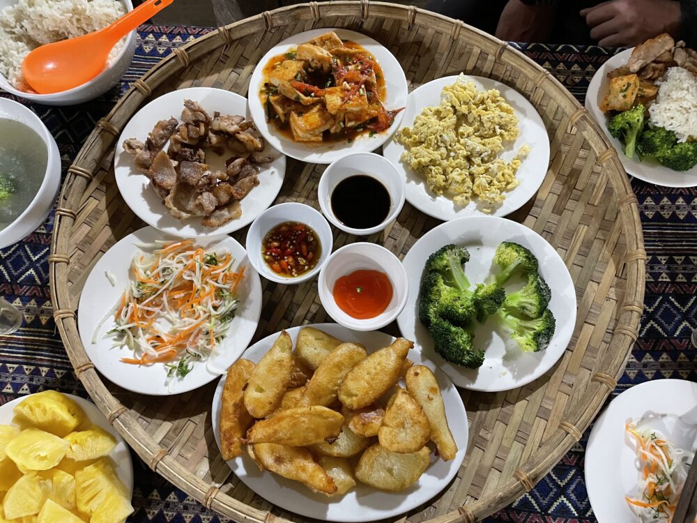 Traditional Vietnamese dishes served on a bamboo platter. 