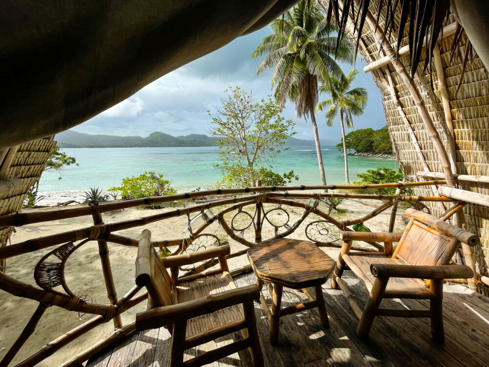 On the balcony of the large huts at Isla Experience