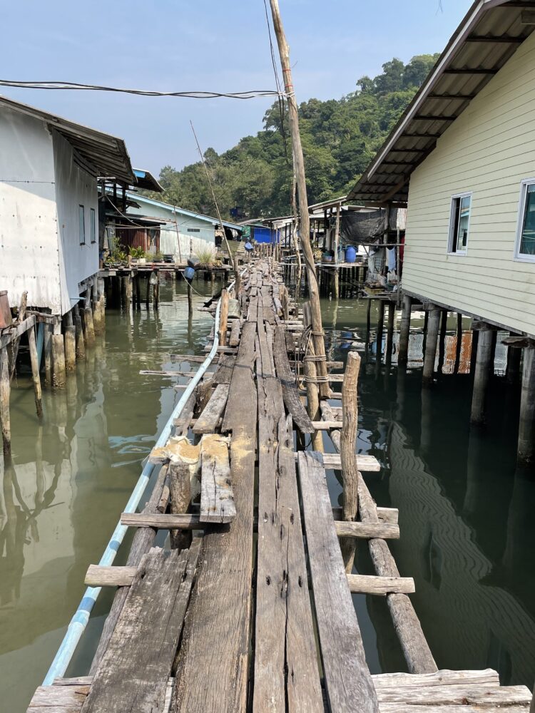 A rickety wooden boardwalk in the fisherman's village of Koh Kood 