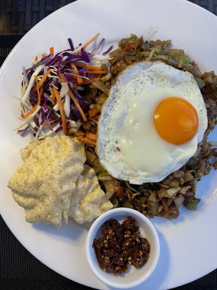 Plate of Kuttu with egg on top. 