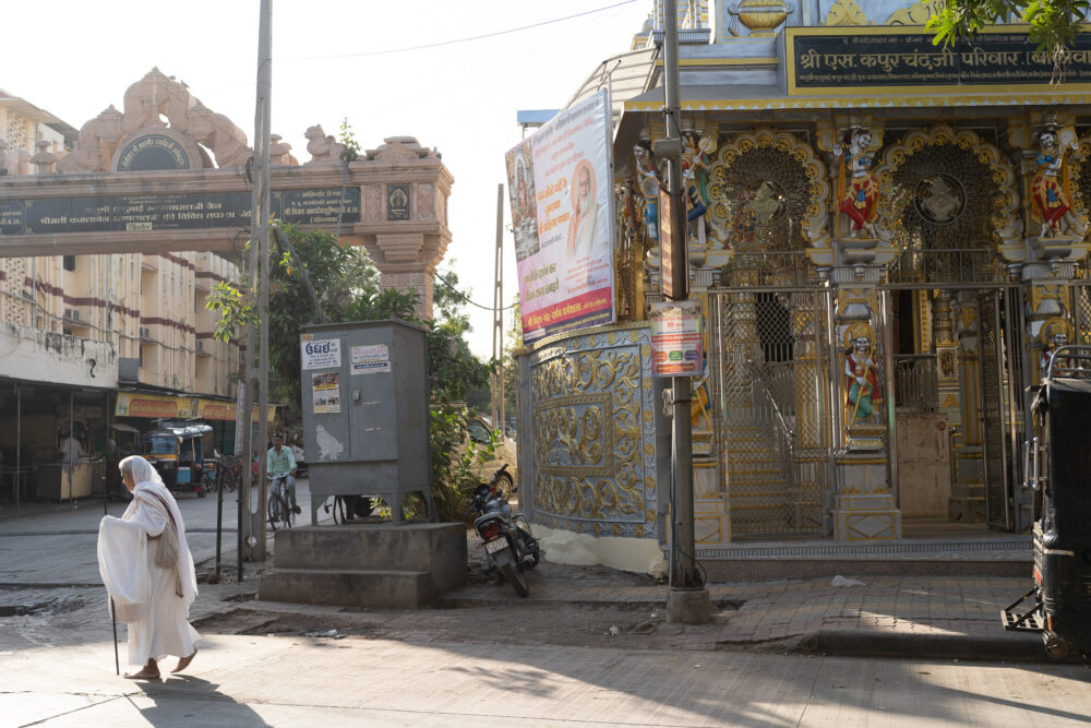 Jain monk walking on the street in my palitana guide 