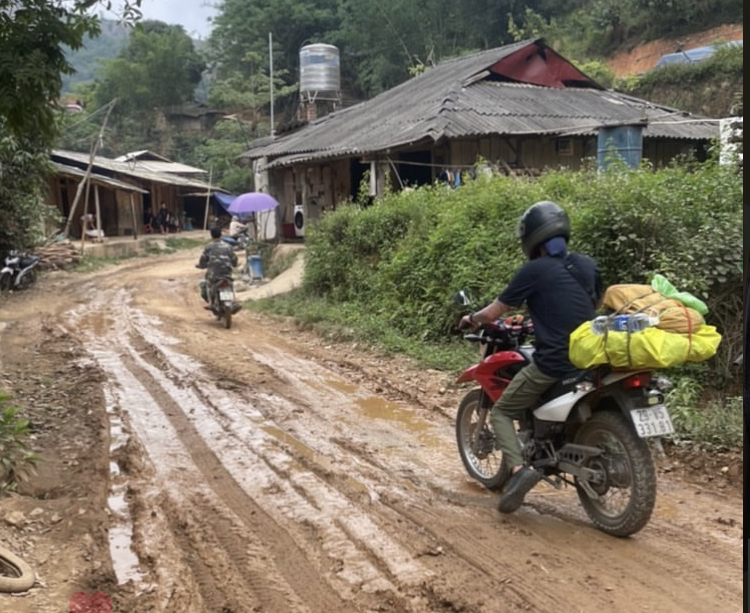 a very muddy road in vietnam 