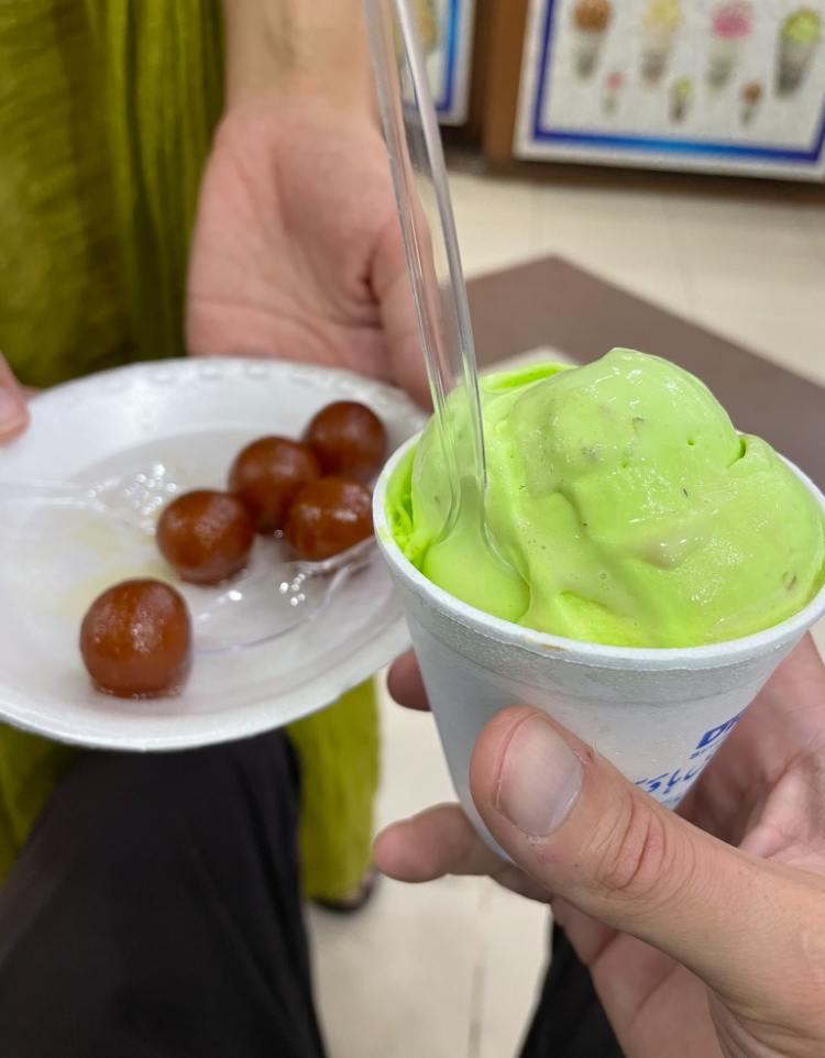 bright green pistachio ice cream and gulab jamun, Pakistan Foodie Guide