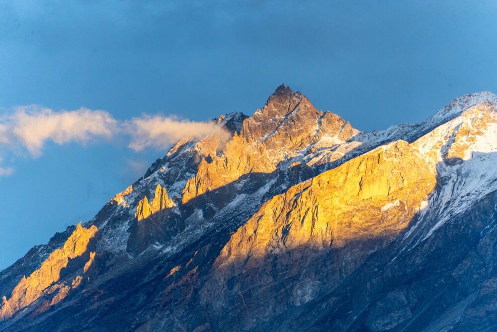 The spines of the Karakoram mountains during sunset. 
