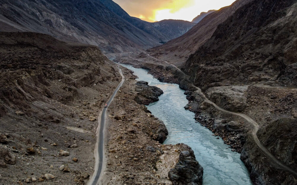 Aerial view of the Karakoram highway and a river in Pakistan 