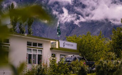 The outside of a mountain hotel on this pakistan itinerary 