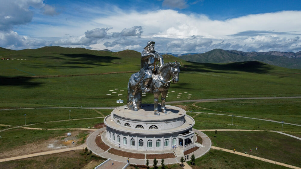 large silver chenggis khan statue in the vast mongolia grasses
