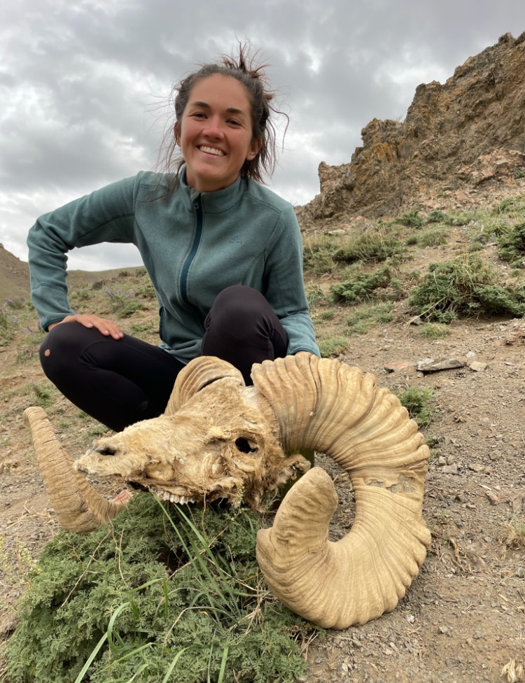 me next to a large sheep skull in Mongolia 