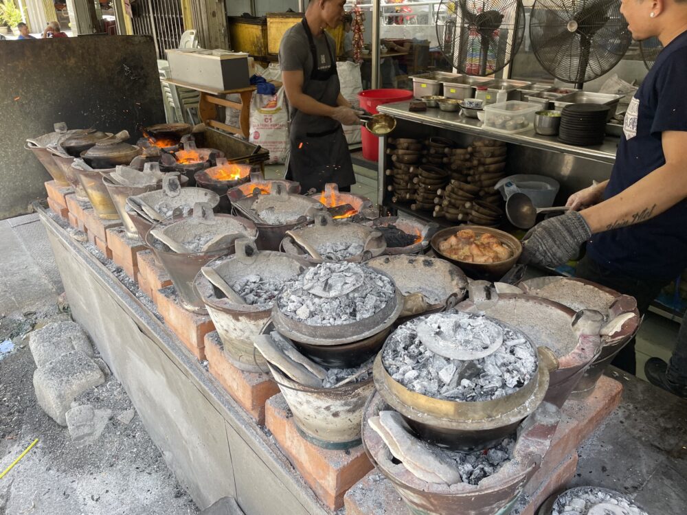 charcoal pots they cook the chicken in on the street 