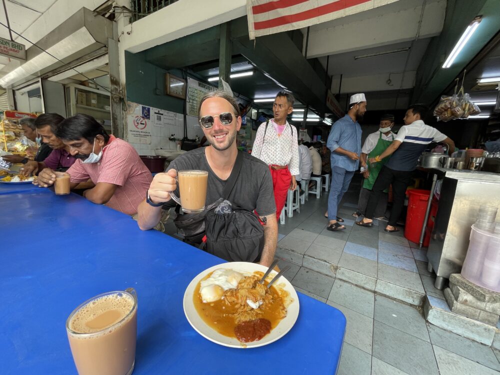 evan drinking his coffee next to the dish