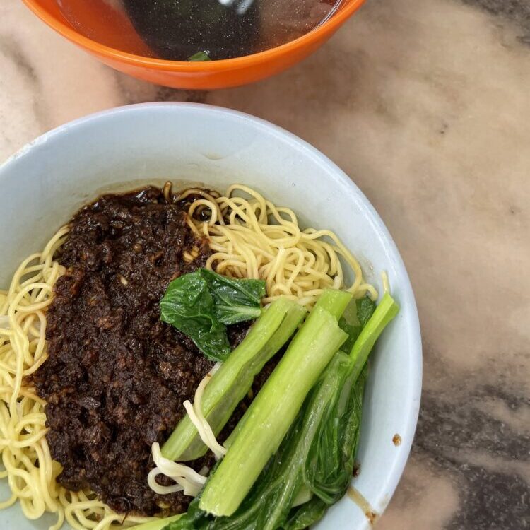 close up of beef on noodles 