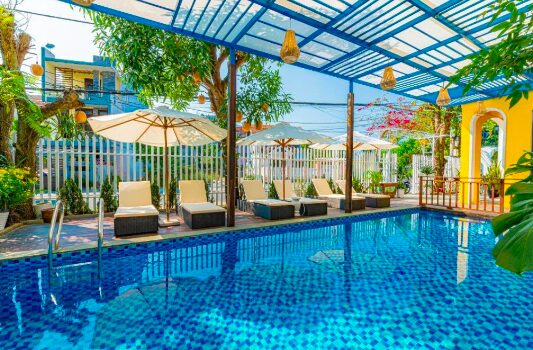 off the beaten path Vietnam Itinerary  with a bright blue pool 