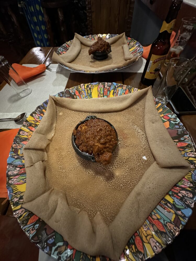 injera and curry in Ethiopia. the most common meal while Backpacking in Ethiopia 