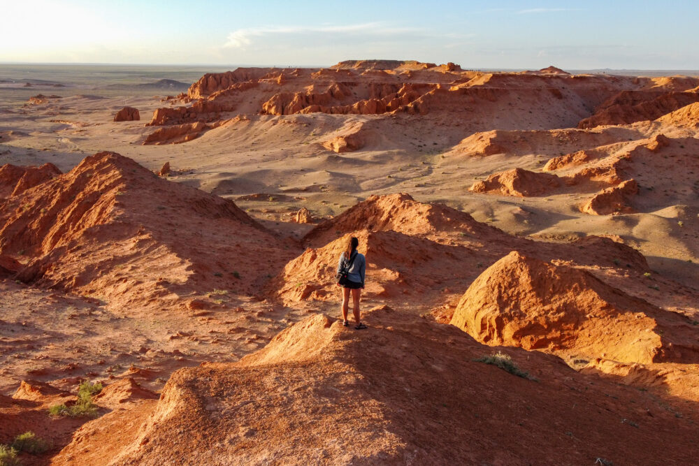 me, standing on top of an orange desert