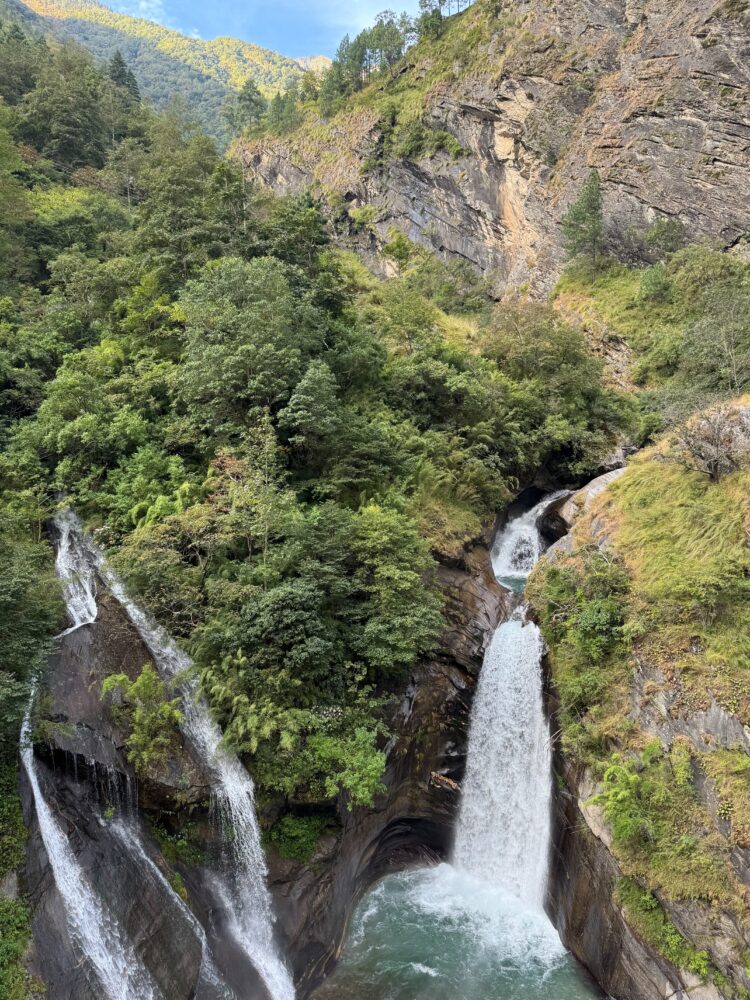 Waterfalls in Nepal with lots of green hills