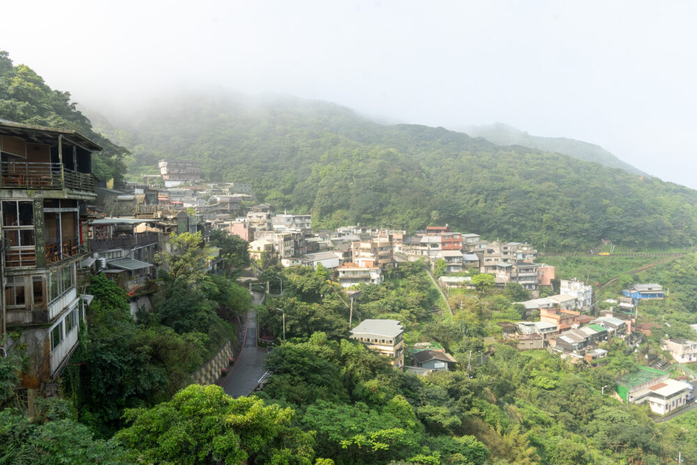 green landscape of Taiwan with a village in the hills 